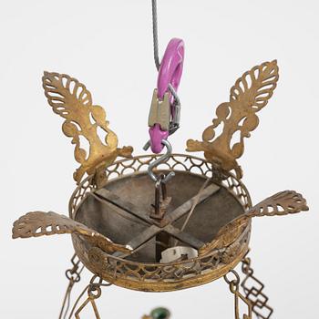 A presumably Russian Empire gilt and patinated bronze nine-branch chandelier, 19th century.