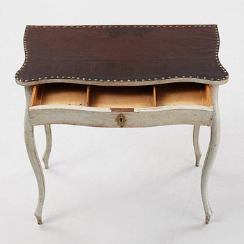 A rococo-style painted table, 19th century.