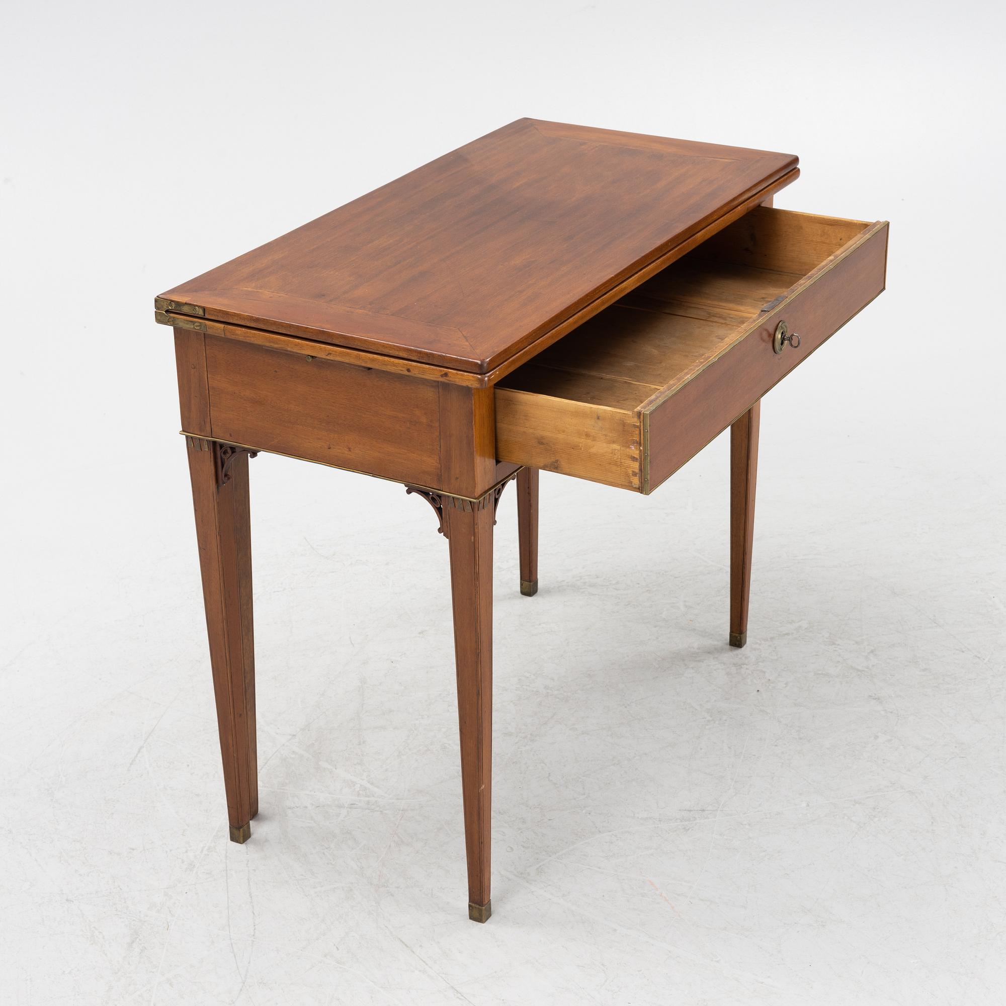 A late Gustavian cardtable. from around the year 1800-.