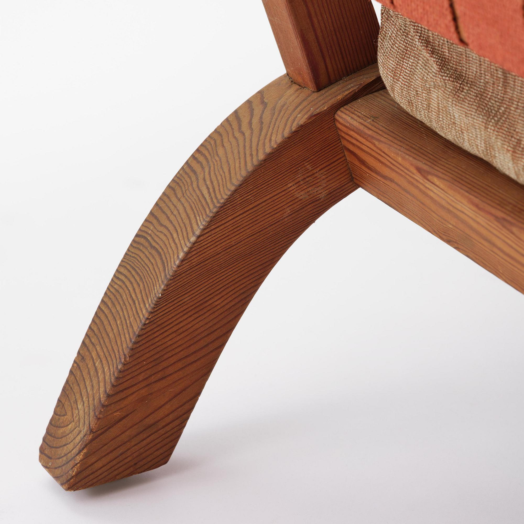 Axel Einar Hjorth, a stained pine "Väddö" easy chair, Nordiska Kompaniet, Sweden, 1930s-40s.