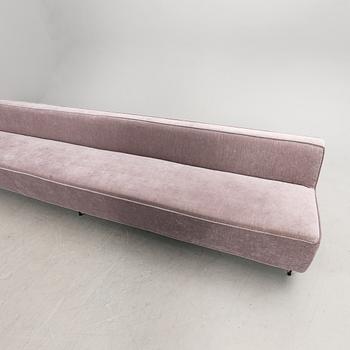 An 2021 sofa Modern Line' by Greta Magnusson Grossman, produced by Gubi.