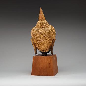 A gilt bronze head of Buddha, Thailand, 19th Century.