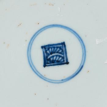 A set of four blue and white dragon dishes, Qing dynasty, 18th Century.