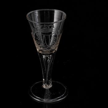 A wine glass with the monogram of the Swedish king Adolf Frederick, 18th Century.
