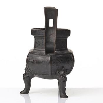 A bronze tripod censer, Qing dynasty, 17th/18th Century.