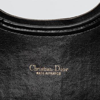 Christian Dior, Oblique fold-over convertible clutch.