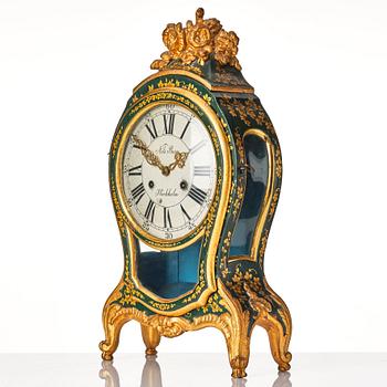 A Swedish rococo mantel clock by N Berg.