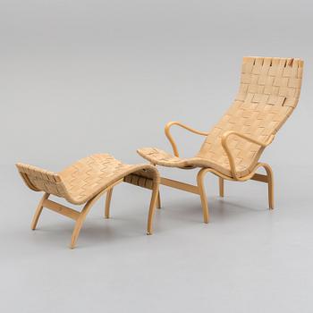 A 'Pernilla' easy chair and foot stool, Bruno Mathsson,  1967.