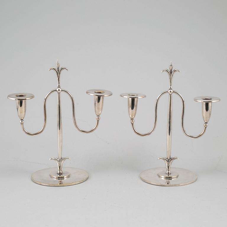 a pair of Elis Bergh silver plated candelabras, Swedish grace, CG Hallberg, Stockholm, 1920s.