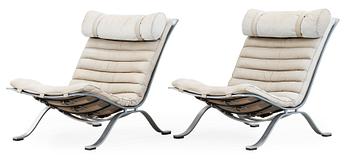 34. A pair of Arne Norell 'Ari' grey leather lounge chairs, Norell, Sweden.