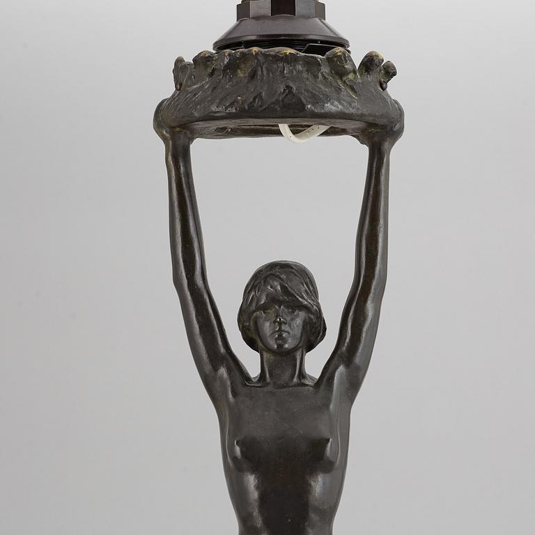 GERDA SPRINCHORN, an Art Nouveau green patinated bronze lamp "The Sun", Herman Bergman, Stockholm, early 20th century.
