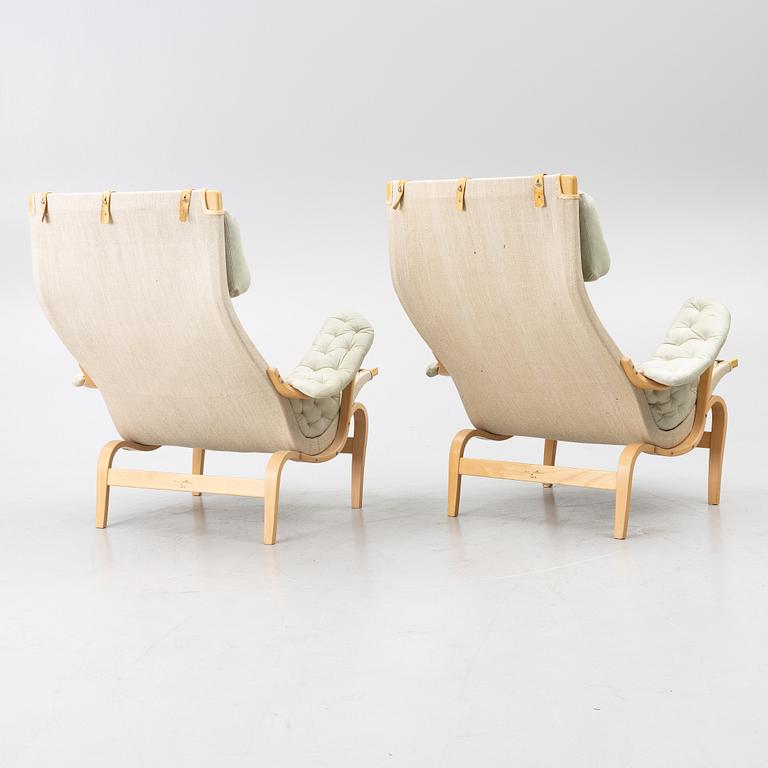 Bruno Mathsson, a pair of 'Pernilla' armchairs, Dux, Sweden, later part of the 20th century.
