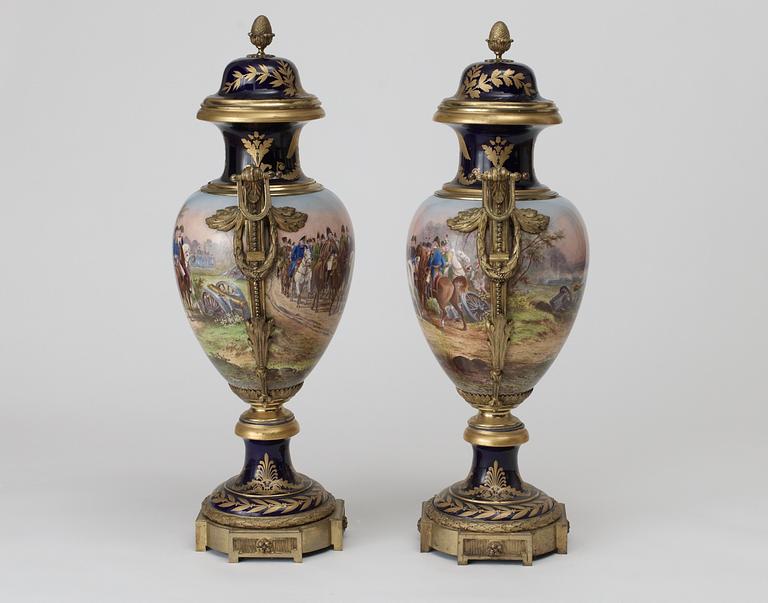 A pair of large bronze mounted vases with covers, France, second half of 19th Century.