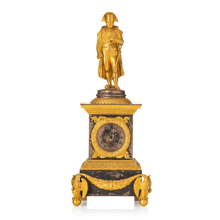 A French Empire ormolu and silvered bronze figural mantel clock, first part of the 19th century.