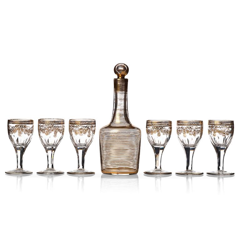 A set of six Russian glass goblets and a bottle with stopper, 19th Century.