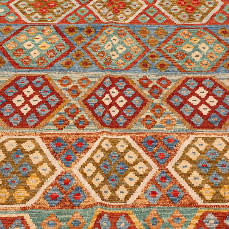 An oriental kilim, around 250 x 170 cm.