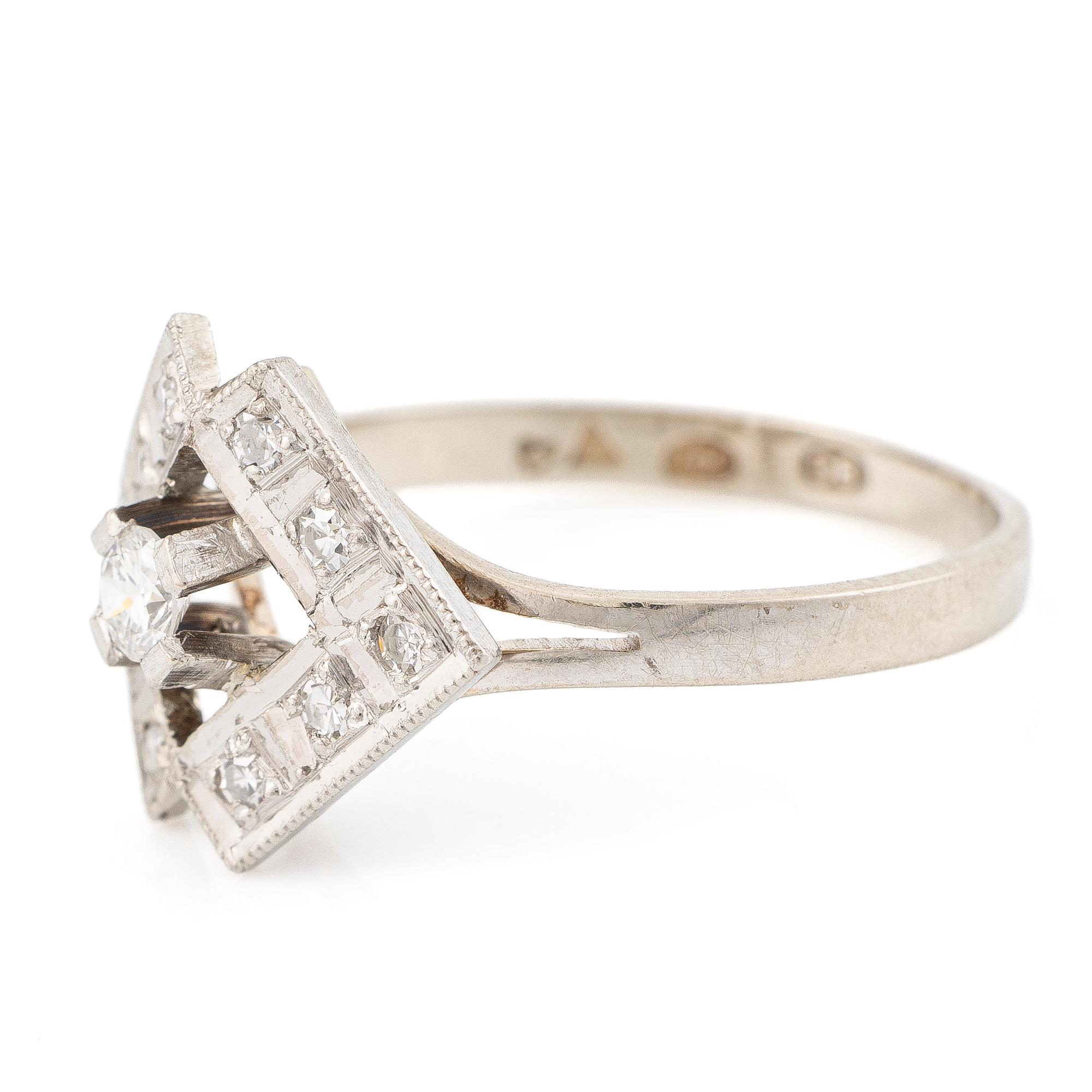 18K white gold ring set with brilliant-cut and single-cut diamonds, A. Koru 1981.