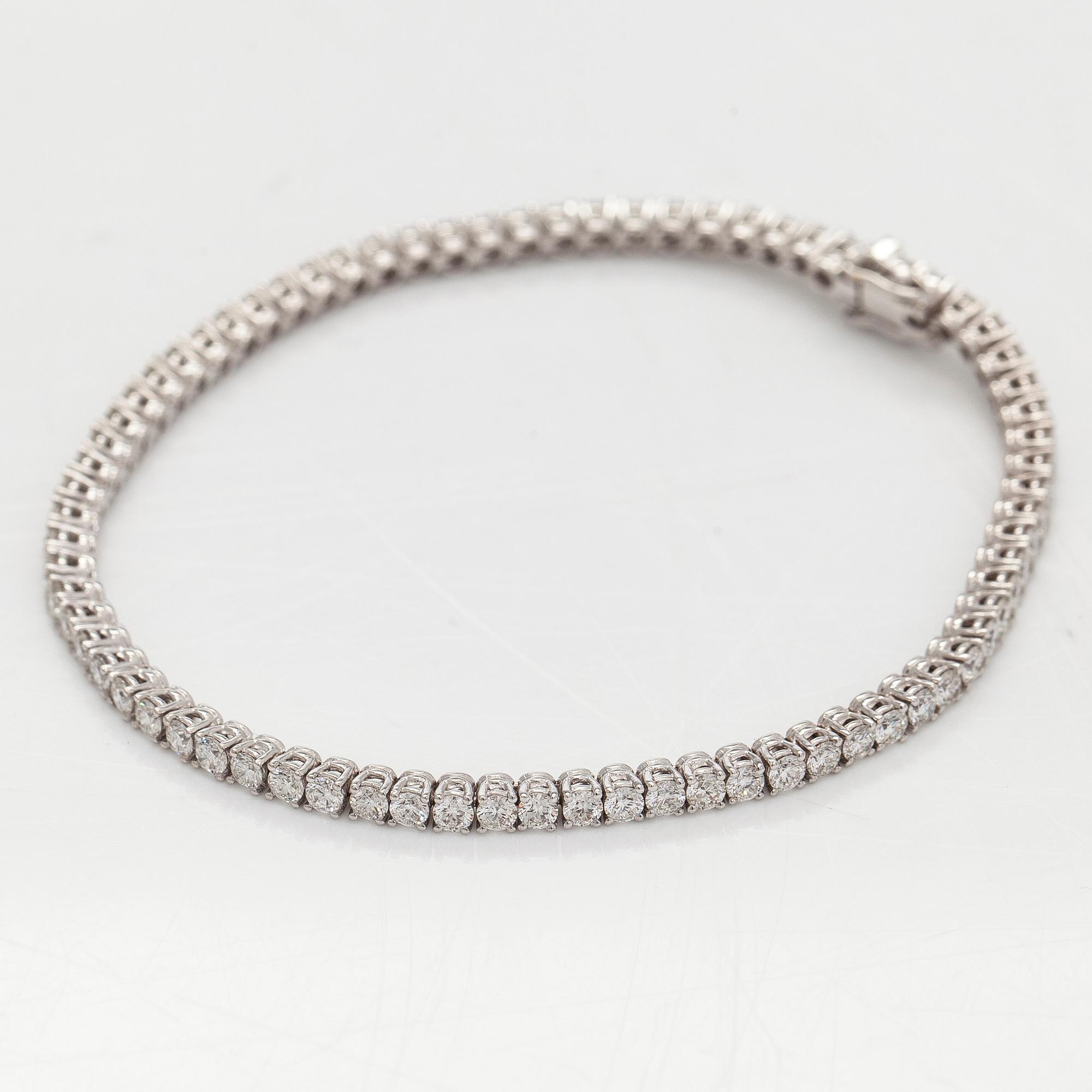 Tennis bracelet, brilliant-cut diamonds, 18K white gold.
