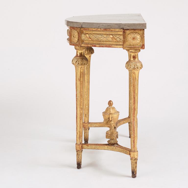 A Gustavian carved giltwood console table, late 18th century.