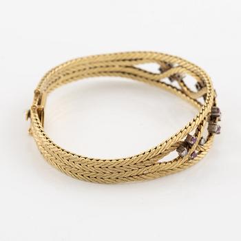 Armband 18K guld med rosa safirer och briljantslipade diamanter.