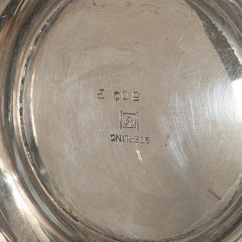 A sterling silver bowl with handle, signed with monogram CMM, 20th century.