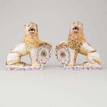 A PAIR OF FRENCH FAYENCE BOOK ENDS, 20th century.