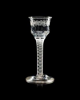 621. An engraved wine glass, 18th Century, presumably English.