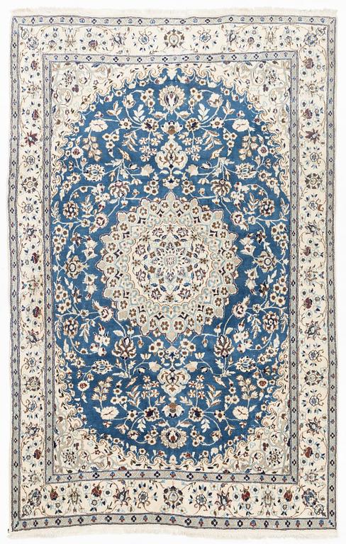 A Nain carpet, circa 310 x 196 cm.