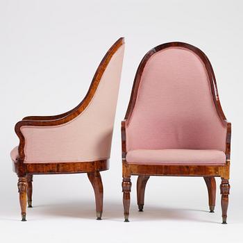 A pair of Baltic mahogany fauteuils, mid 19th century.