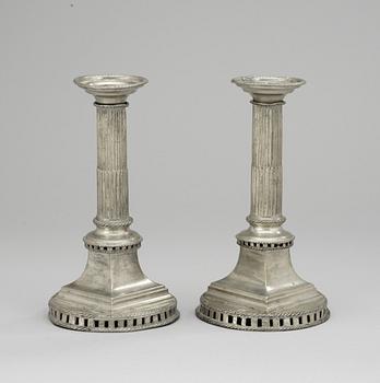 A matched pair of late Gustavian pewter candlesticks by G. F. Baumann.