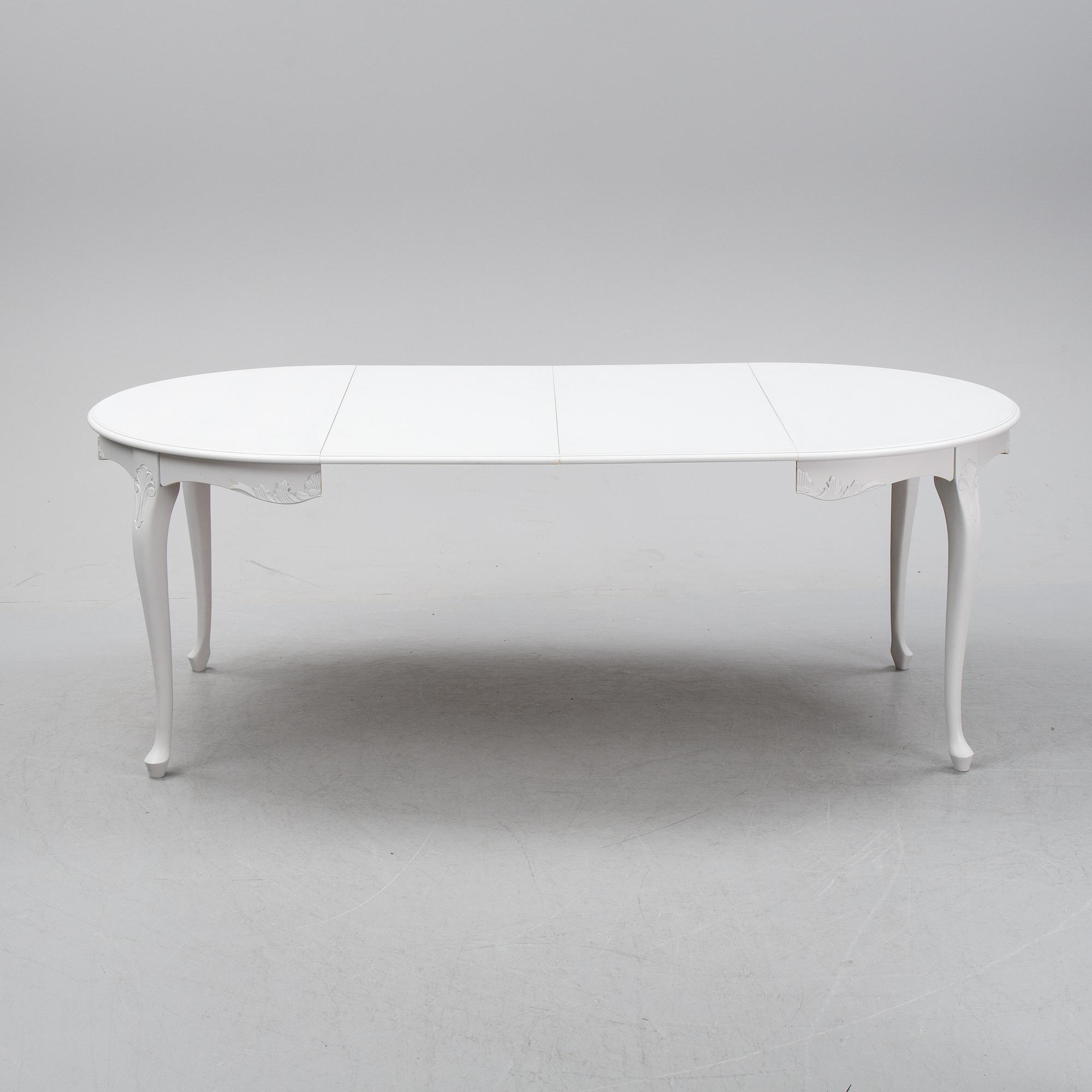 A painted Rococo style dining table, second half of teh 20th century.