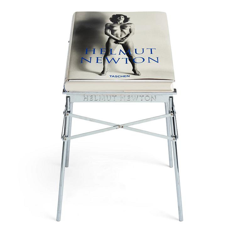 Helmut Newton, Signed book published by Taschen, Monte Carlo, 1999, ed 10000, with a metal table.