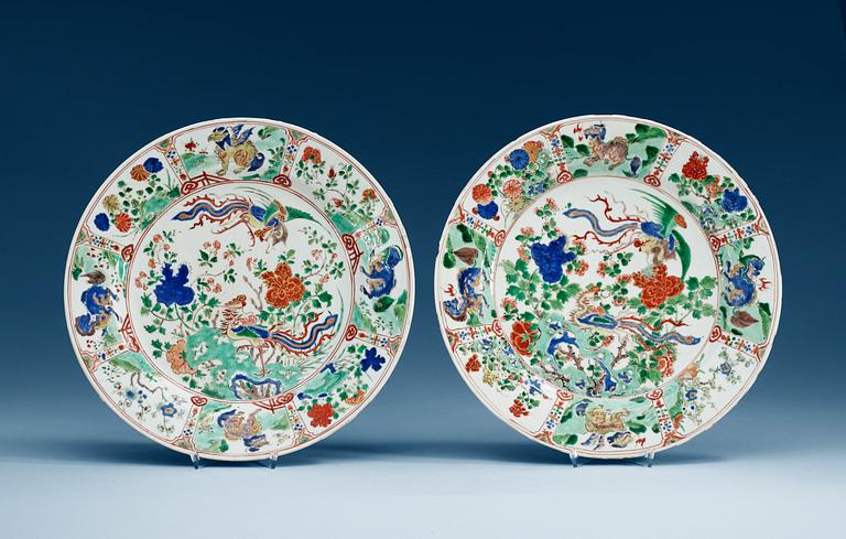 A pair of famille verte chargers, Qing dynasty, with Kangxis six character mark and period (1662-1722).