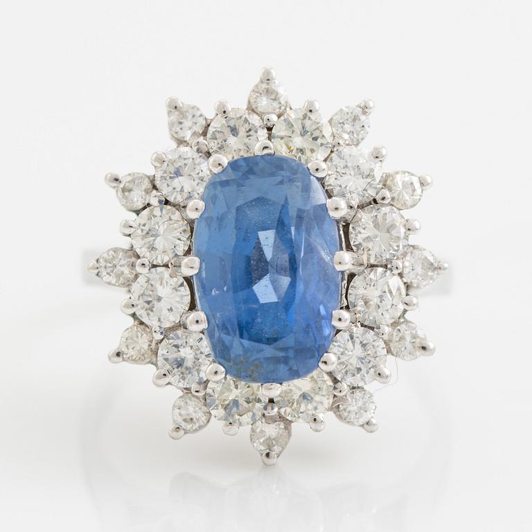 Sapphire and brilliant cut diamond cluster ring.