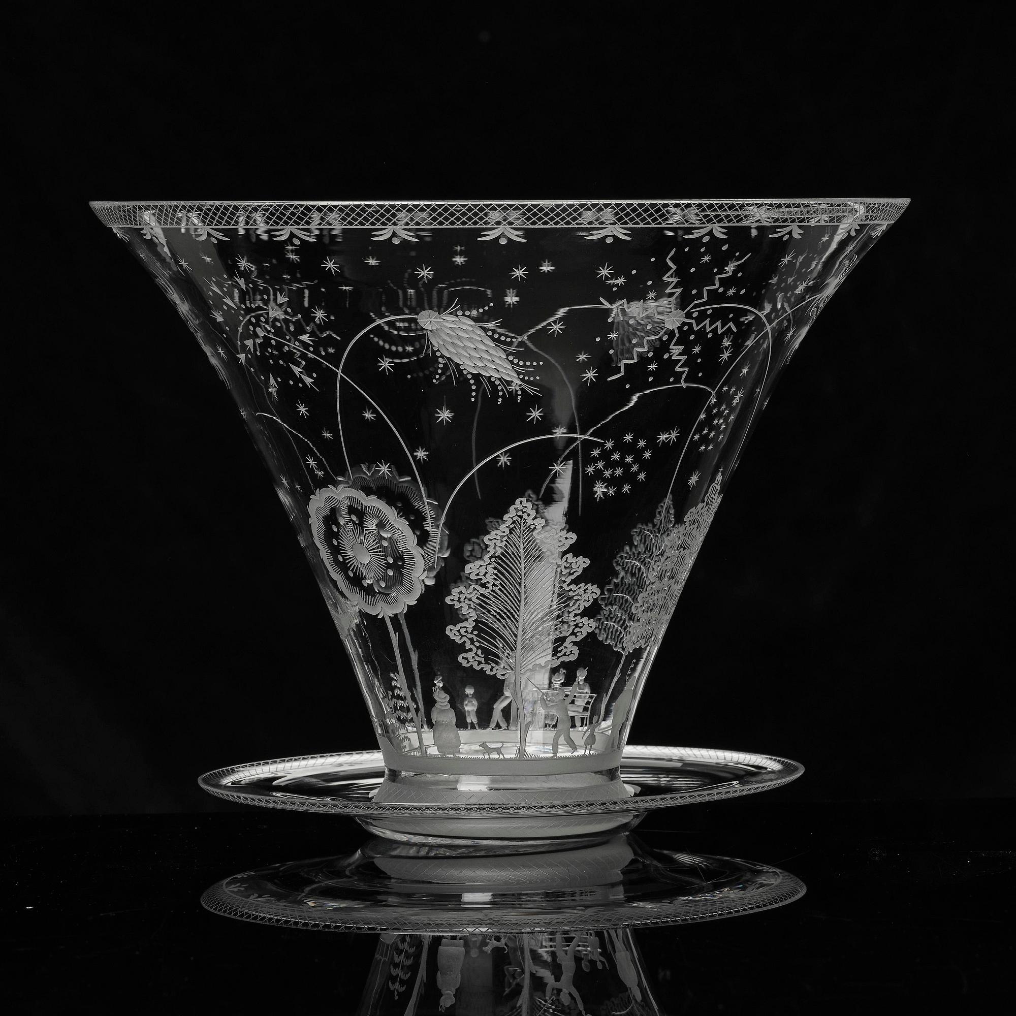 Edward Hald, a Swedish Grace "Fyrverkeri" (Fireworks) engraved glass bowl with a plate, Orrefors, Sweden, 1925, model 248.