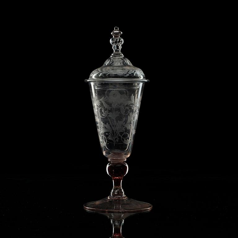 An engraved armorial goblet with cover, 18th Century.