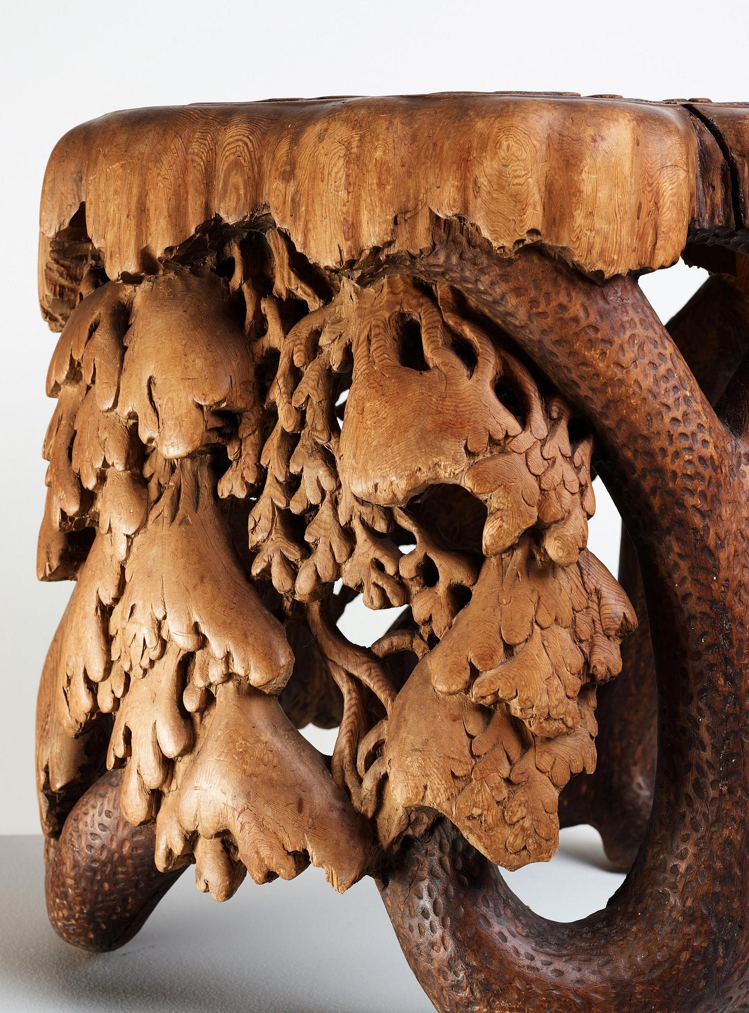 Knut Fjaestad, A Knut Fjaestad Art Nouveau sculptured pine table, Sweden ca 1900.