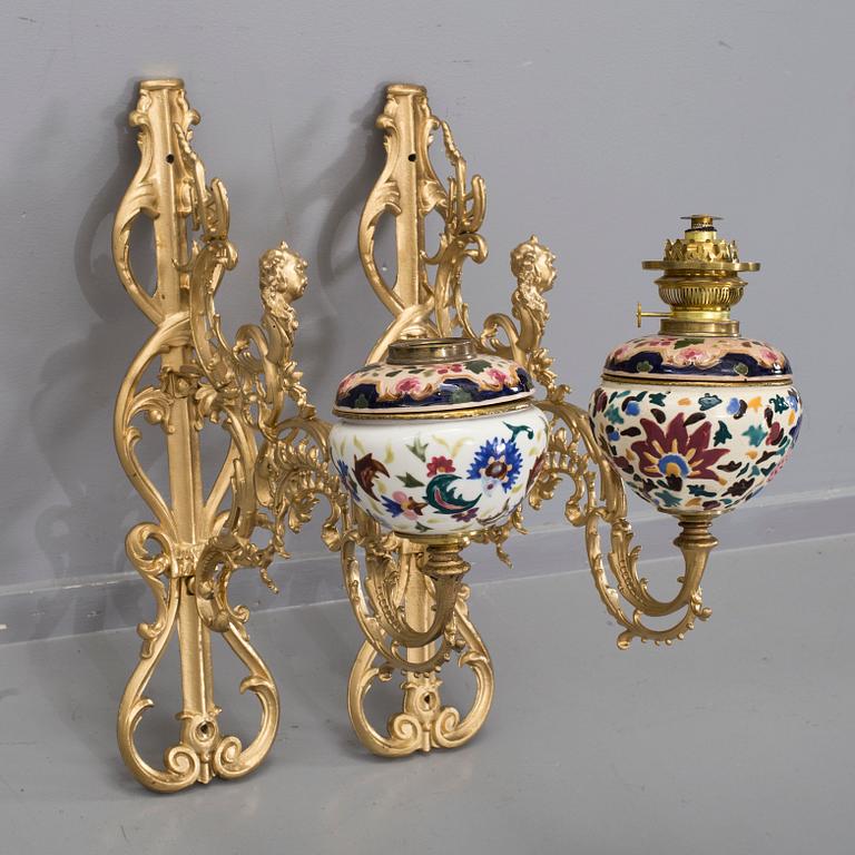 A pair of wall paraffin lamps, turn of the century 1900. Made by Ljungdells Malmö Sweden.