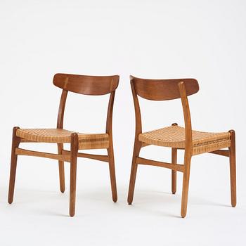 Hans J. Wegner, a set of six teak and rattan  'CH-23' chairs, Denmark 1950s.