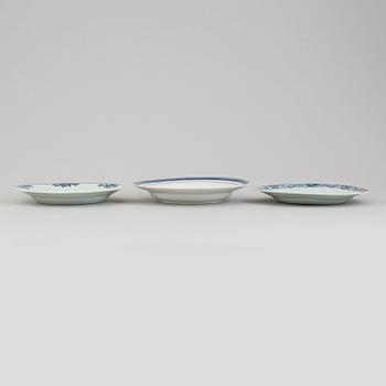 Two blue and white export porcelain plates and a soup plate, Qing dynasty, Qianlong (1736-95).