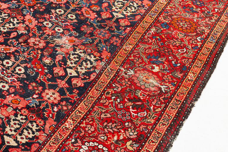A Farahan carpet, c. 520 x 205 cm.