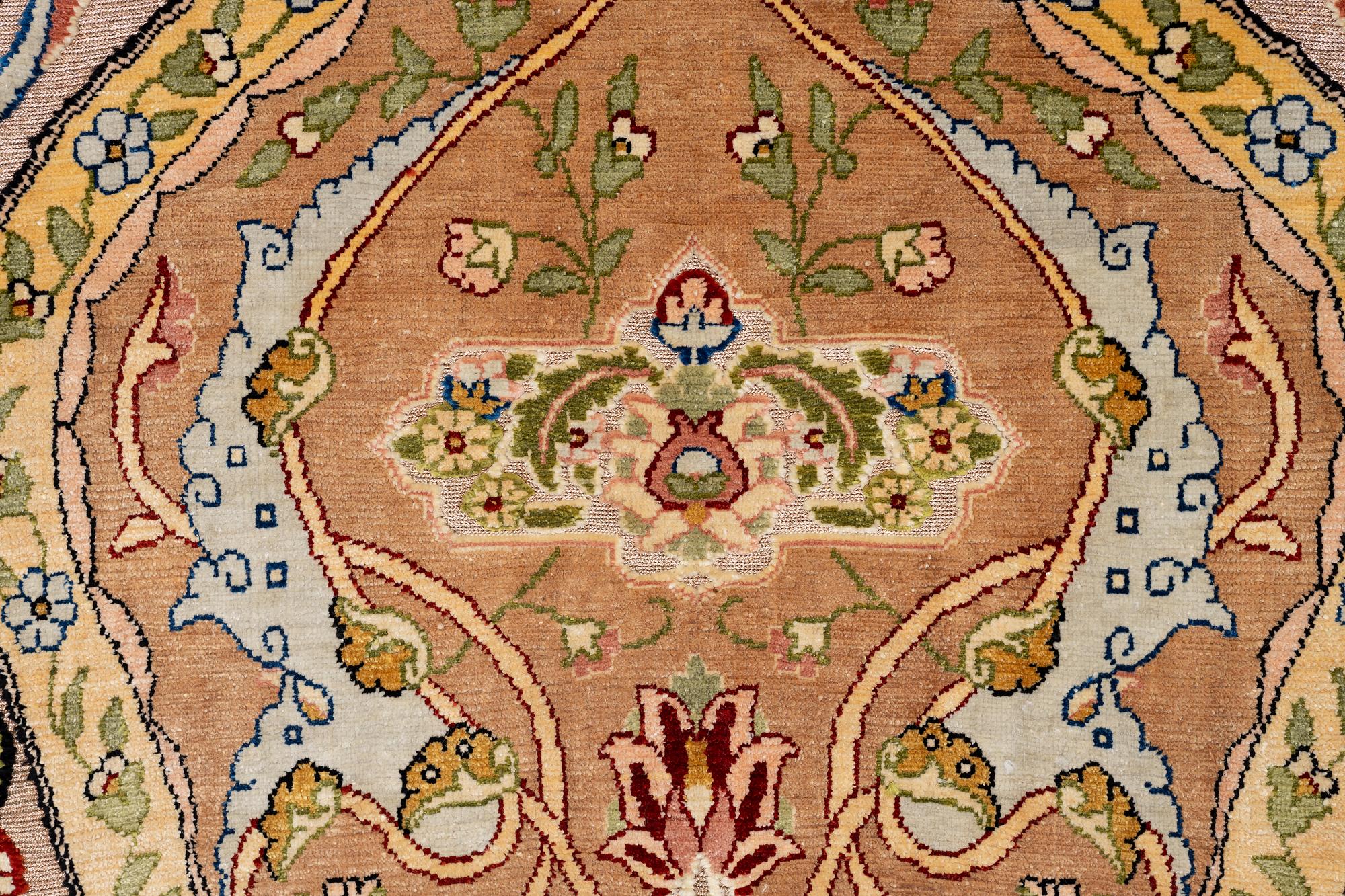 A semi-antique Hereke souf, silk and metal thread rug, West Anatolia, c. 163 x 103 cm.