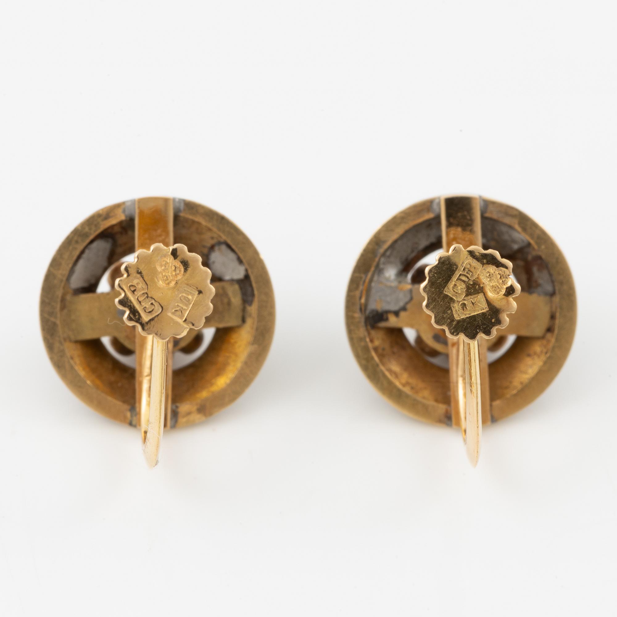 Earrings, a pair, 18K gold with meander border and rose-cut diamonds.