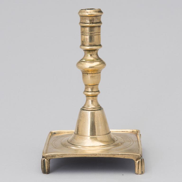 A brass candlestick from the end of the 17th century.