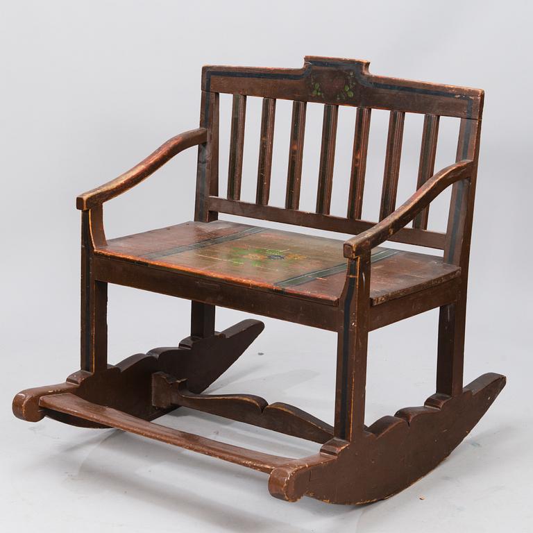 A 19th century wooden rocking chair.