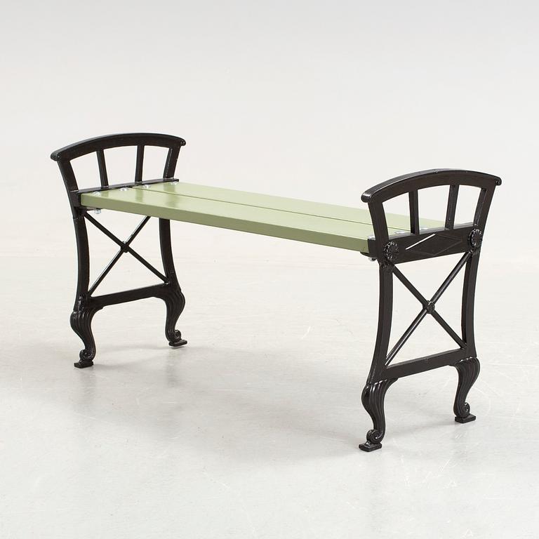 A Folke Bensow cast iron and wood park bench, Näfveqvarn, 20th Century.