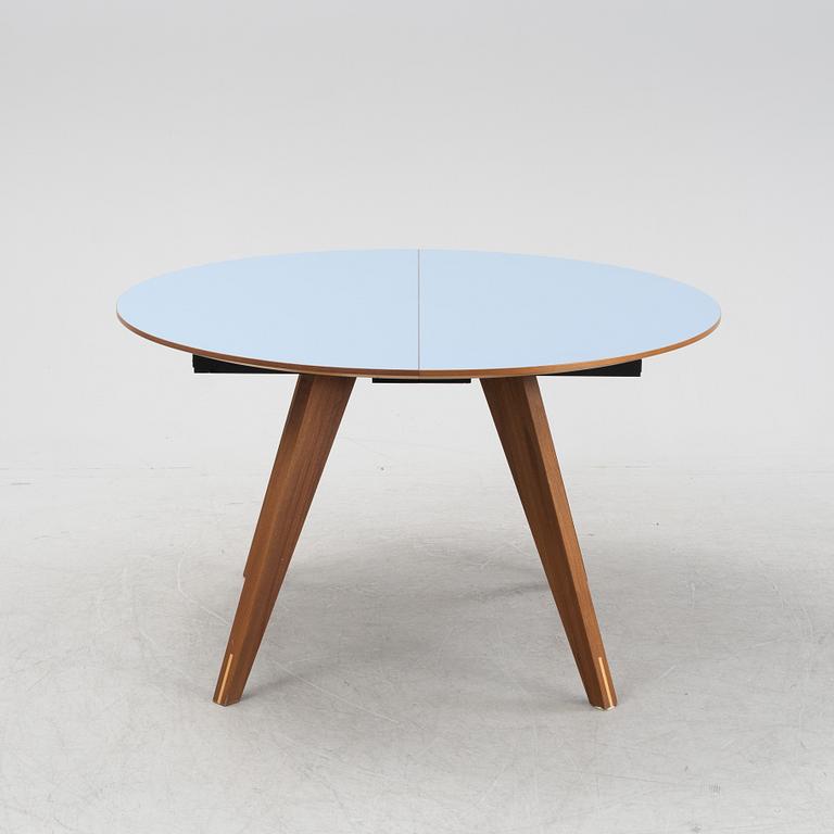 A 'New Mood' dining table by Michel H Nielsen for Bolia.