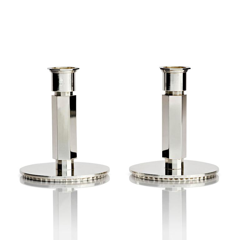Wiwen Nilsson, a pair of sterling silver candlesticks, Lund, Sweden 11957 and 1960.