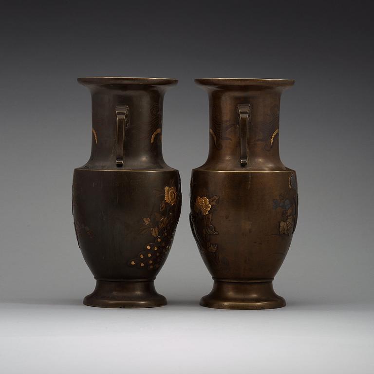 A pair of Japanese bronze vases, Meiji (1868-1912).