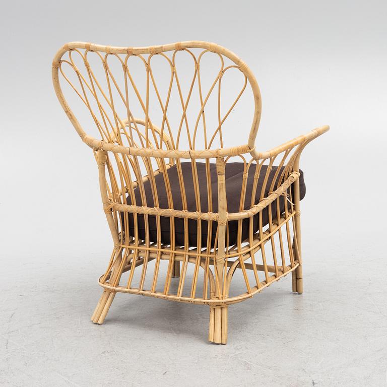 Josef Frank, a model 311 rattan armchair, Firma Svenskt Tenn.